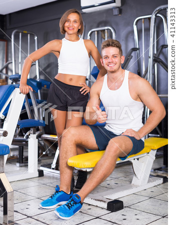 man taking break during workout in gym indoors man taking break during workout in gym indoors 41143313
