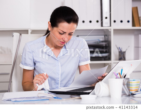 Young woman office worker have lot of work 41143314