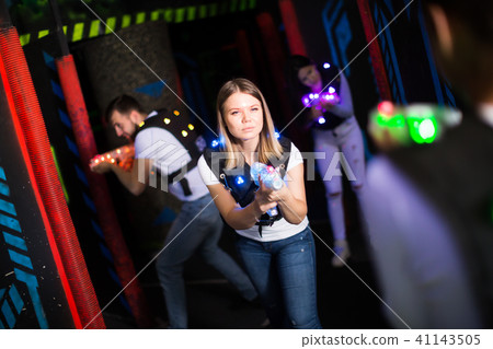 Girl playing laser tag 41143505