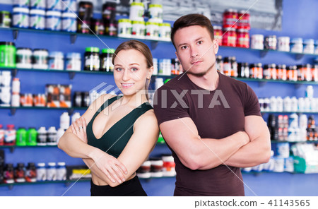 muscular people standing with crossed arms muscular people standing with crossed arms 41143565