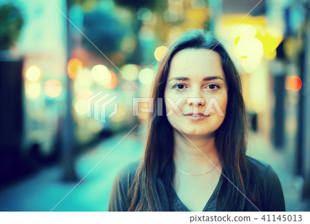 Closeup portrait of happy woman outdoors 41145013