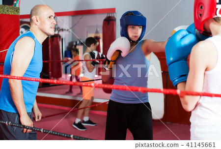 Children training on boxing ring 41145661