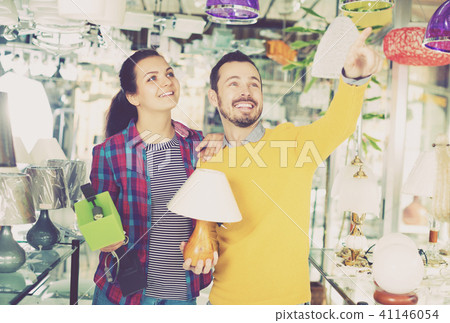 Man with girl points to interesting lamp 41146054