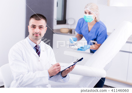 Cosmetologist working with documents 41146060