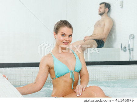 Woman posing in jacuzzi Woman posing in jacuzzi 41146079