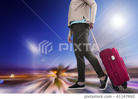 Girl with suitcase on wheels Girl with suitcase on wheels 41147660