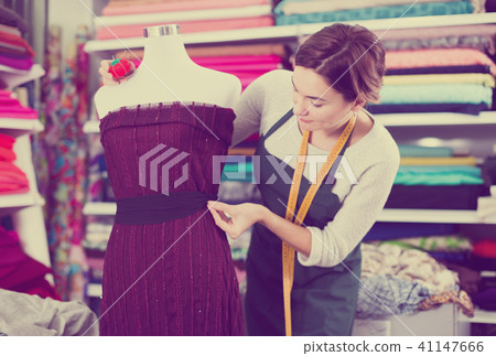 Tailor working at dress Tailor working at dress 41147666