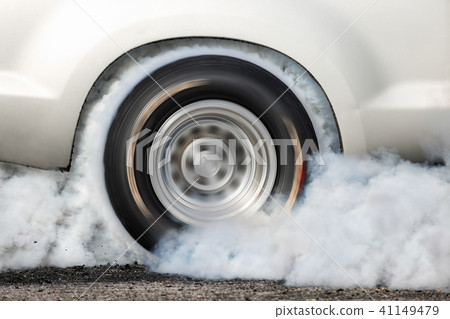 Drag racing car burn tire at start line Drag racing car burn tire at start line 41149479
