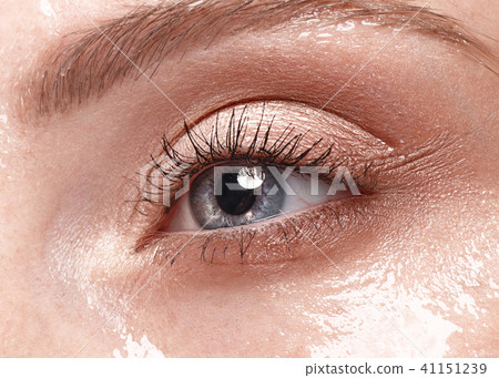 Beautiful young girl with a light natural make-up and perfect wet skin. Beauty face. Beautiful young girl with a light natural make-up and perfect wet skin. Beauty face. 41151239