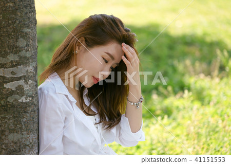 Taking a rest below tree with a sunny day Taking a rest below tree with a sunny day 41151553