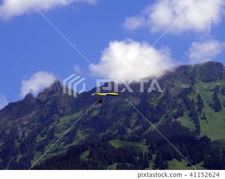 paragliding, parachute mountain in Switzerland paragliding, parachute mountain in Switzerland 41152624
