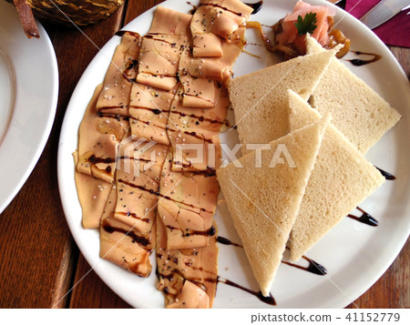 slice raw foie gras with sea salt slice raw foie gras with sea salt 41152779