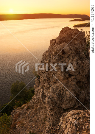 Beautiful sunset in rocky stone beach. Seascape Beautiful sunset in rocky stone beach. Seascape 41154263