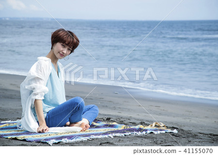 Sea picnic lady outdoor coast travel beach seaside relax Sea picnic lady outdoor coast travel beach seaside relax 41155070