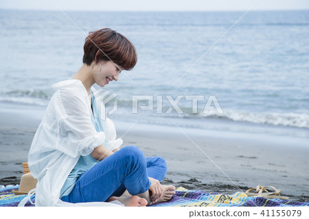 Sea picnic lady outdoor coast travel beach seaside relax 41155079