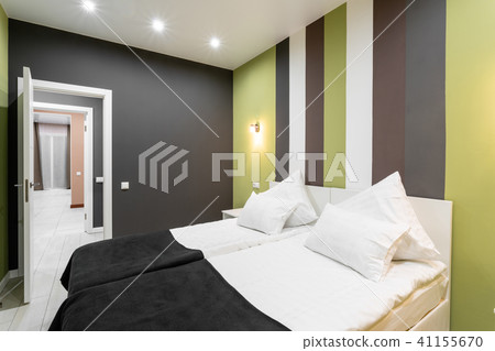 Hotel standart room. modern bedroom with white pillows. simple and stylish interior. interior Hotel standart room. modern bedroom with white pillows. simple and stylish interior. interior 41155670