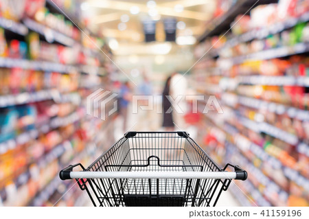 Shopping trolley in department store with goods  41159196
