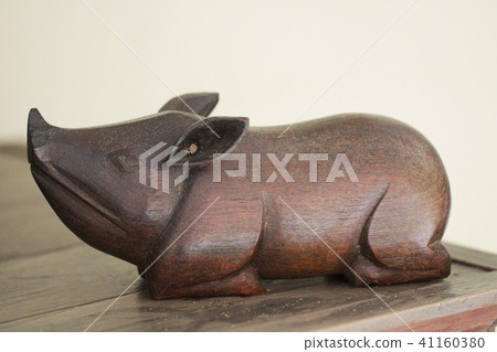 brown wooden wild boar statue souvenir crafting at 41160380
