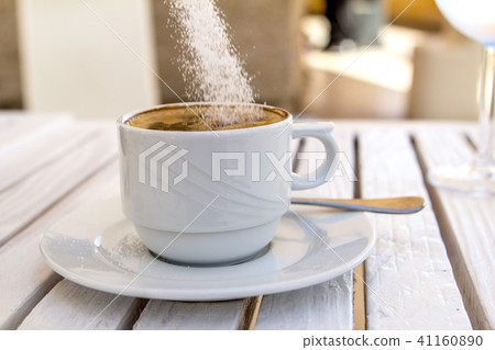 white cappuccino cup and drop sugar white cappuccino cup and drop sugar 41160890