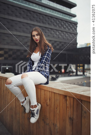 beautiful brunette girl on the street beautiful brunette girl on the street 41162075