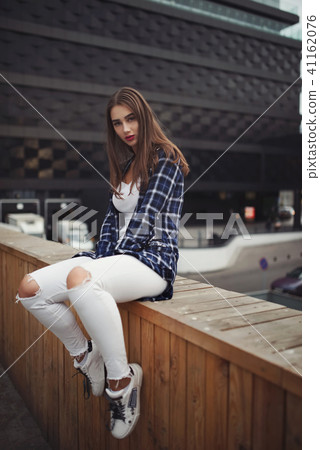 beautiful brunette girl on the street beautiful brunette girl on the street 41162076