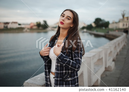 beautiful brunette girl on the street beautiful brunette girl on the street 41162140