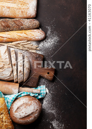 Various crusty bread and buns 41163070