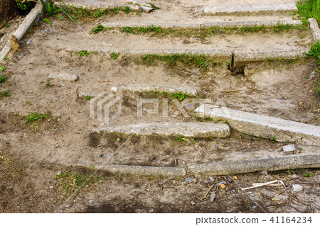 Abandoned ruined steps of a concrete staircase Abandoned ruined steps of a concrete staircase 41164234