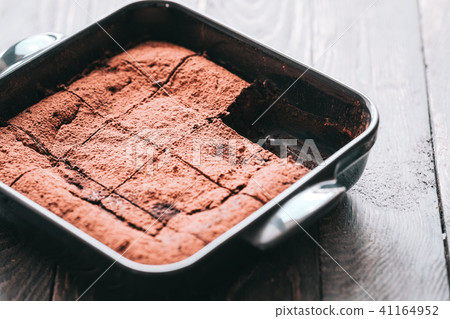 Dark chocolate stout brownies cut in squares Dark chocolate stout brownies cut in squares 41164952