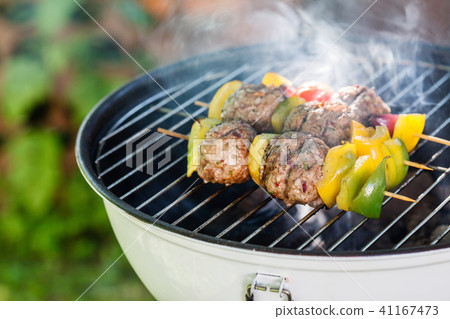 grilled meatballs with vegetables 41167473