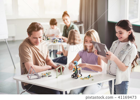 Positive male and children having fun 41169473