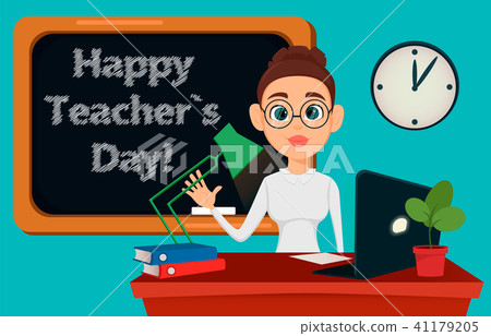 Teacher sitting at her desk while lesson Teacher sitting at her desk while lesson 41179205