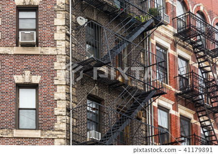 A fire escape of an apartment building in New York city A fire escape of an apartment building in New York city 41179891