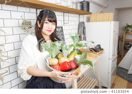 Women with vegetables Women with vegetables 41183854