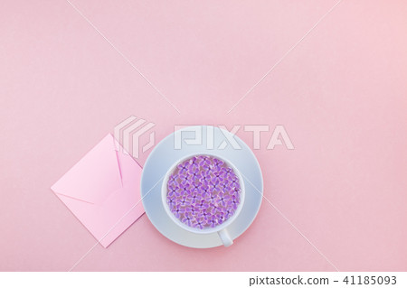 Cup of beautiful lilac flowers infused water Cup of beautiful lilac flowers infused water 41185093