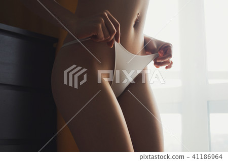 Girl pulls panties up 41186964