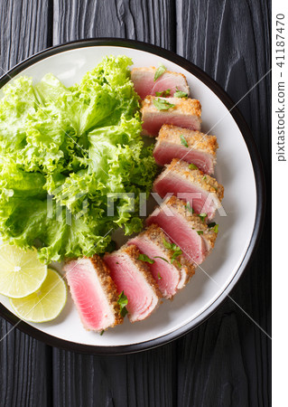Delicious sliced tuna steak fried in breading Delicious sliced tuna steak fried in breading 41187470