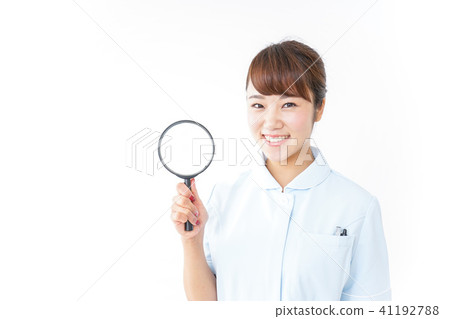Nurse with loupe Nurse with loupe 41192788