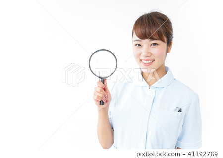 Nurse with loupe Nurse with loupe 41192789
