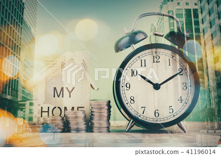 stacking coins and clock over double exposure stacking coins and clock over double exposure 41196014