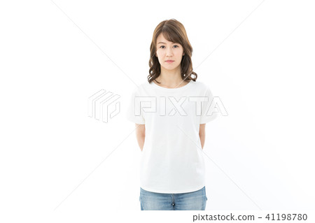 Young woman serious face Young woman serious face 41198780