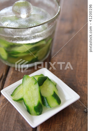Lightly pickled cucumbers made in a glass pickle maker Lightly pickled cucumbers made in a glass pickle maker 41200196