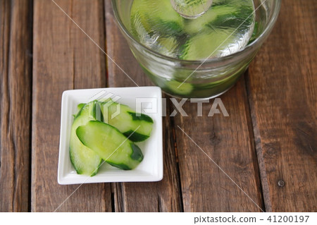 Lightly pickled cucumbers made in a glass pickle maker Lightly pickled cucumbers made in a glass pickle maker 41200197