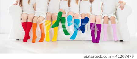Kids with colorful socks. Children footwear. 41207479