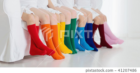 Kids with colorful socks. Children footwear. 41207486