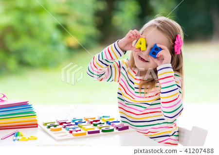 Child doing homework for school. Kids learn 41207488