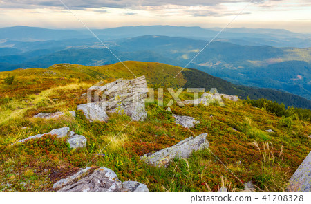 boulders on the edge of hillside boulders on the edge of hillside 41208328