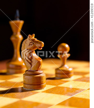 Chessboard with figures on dark 41209319