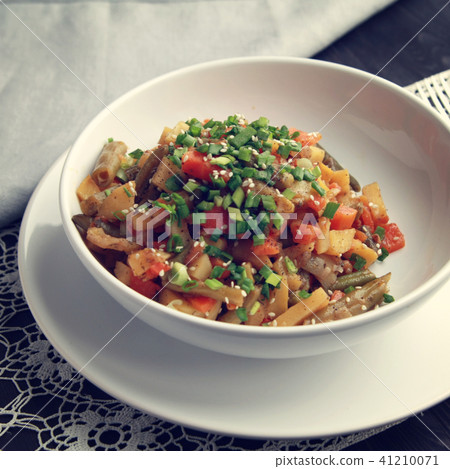 Vegetable stew with carrot and green beans Closeup Vegetable stew with carrot and green beans Closeup 41210071