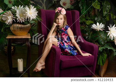Teenager girl in flower wreath 41210433